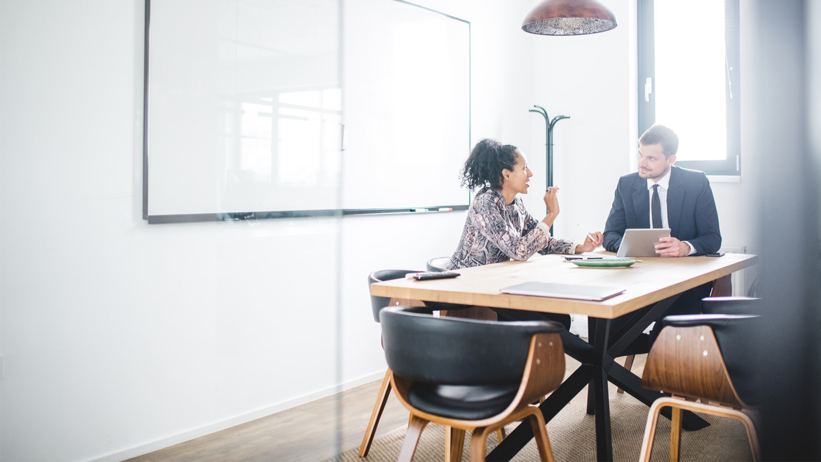 two people in a business meeting