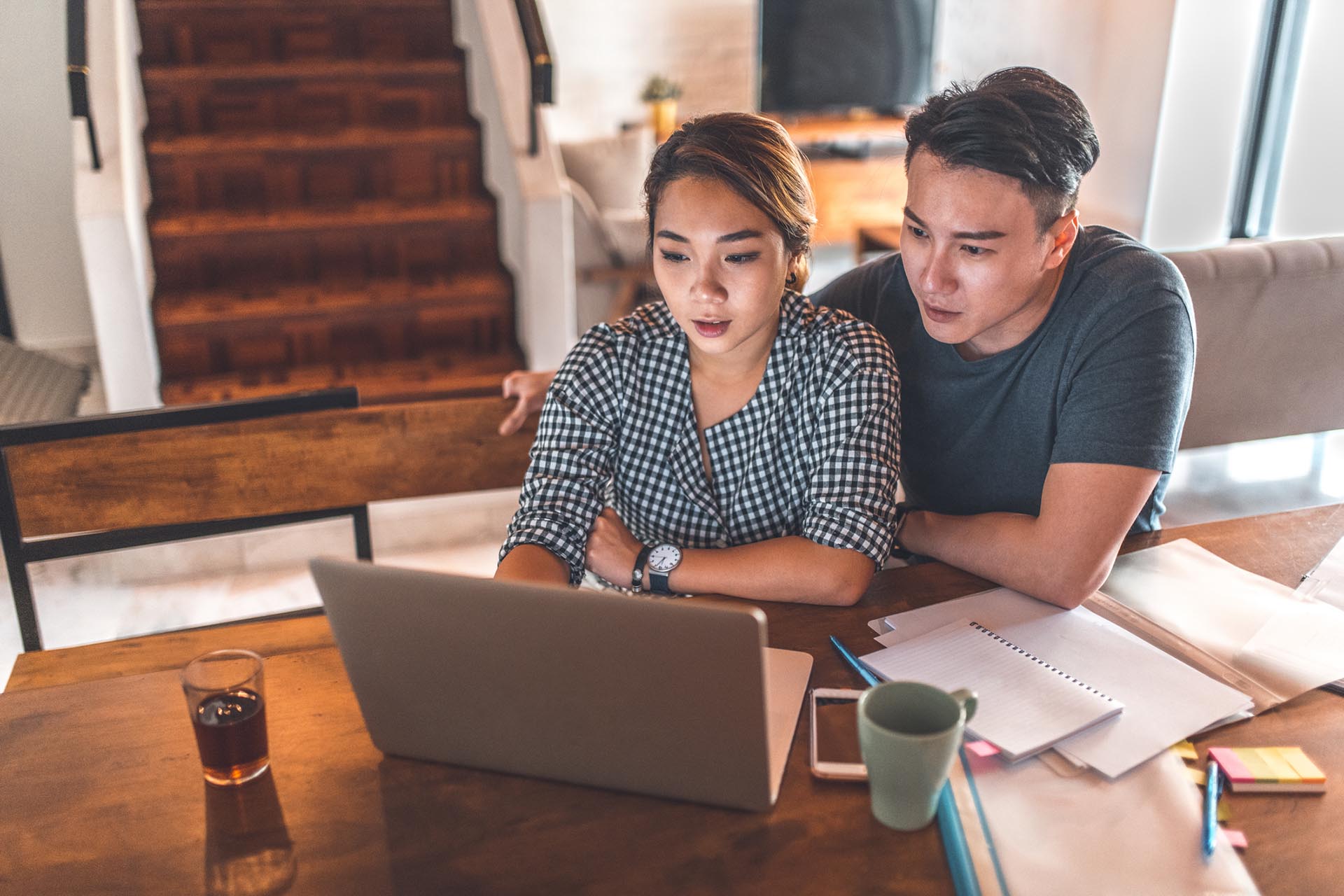 couple looking at a laptop