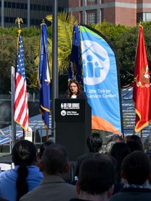 People gathered for a ribbon-cutting event