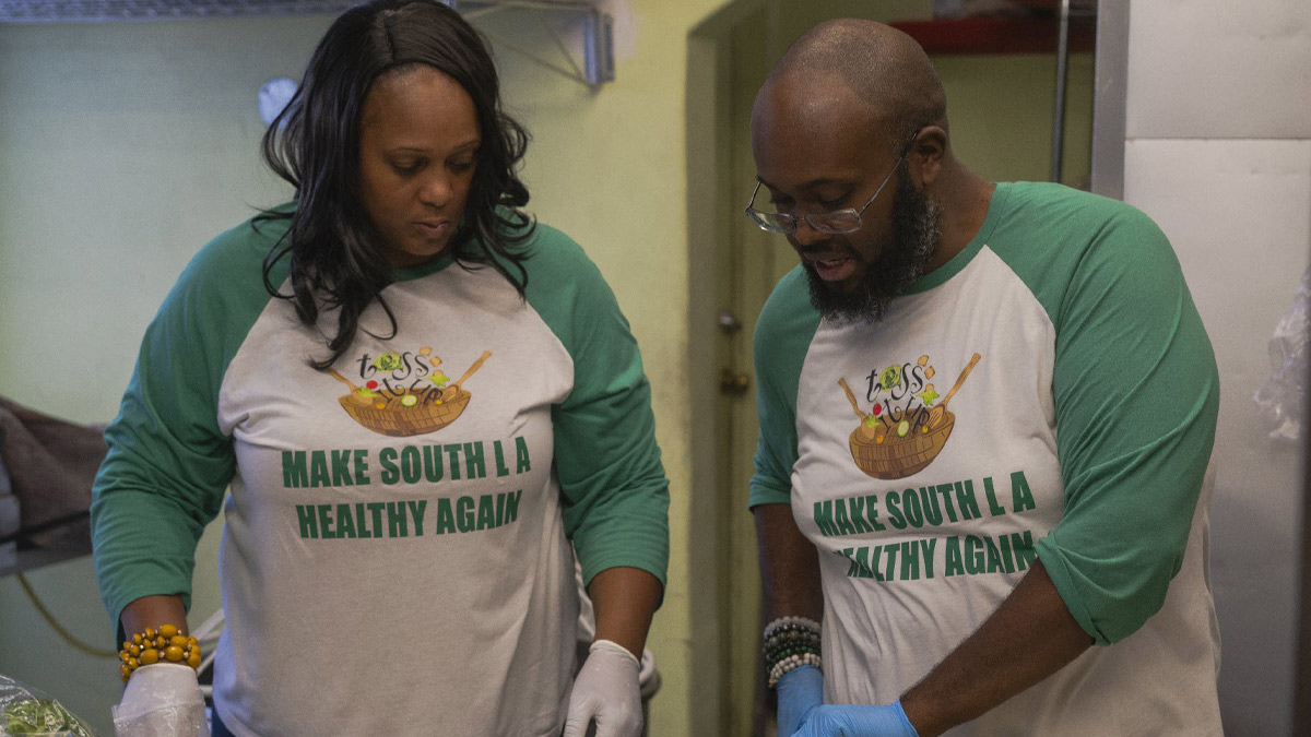 Javonne Sanders and Matthew N. Crawford of Toss It Up salad bar.