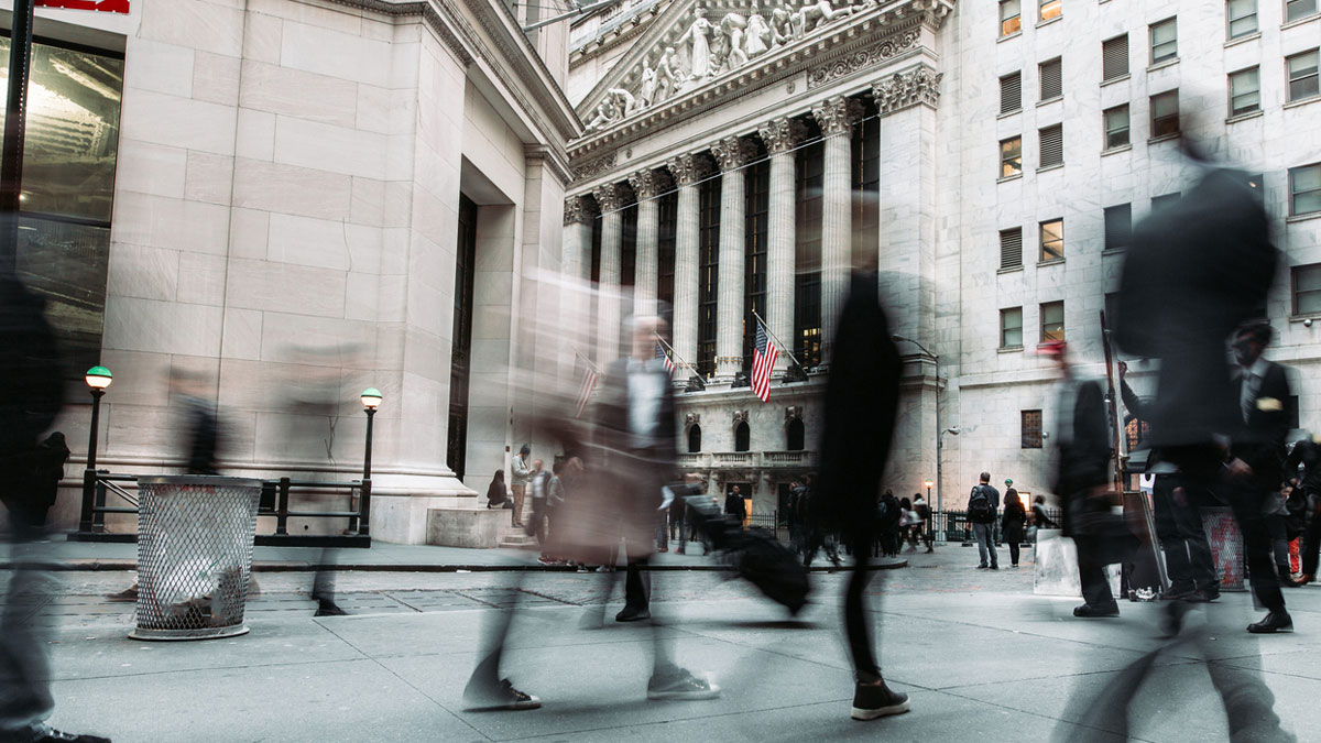 People walking in New York's financial district.