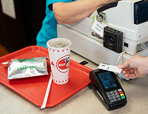 A credit card and a card payment machine.