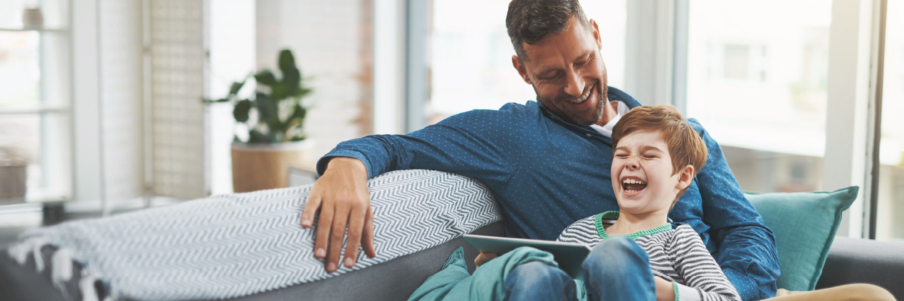 Family smiling after reviewing bank accounts