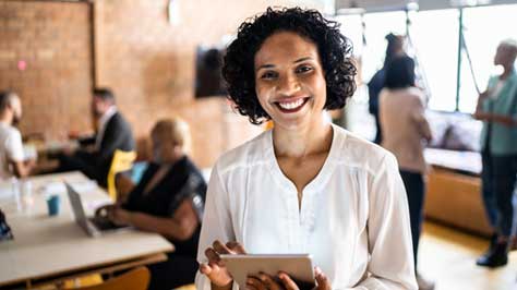 Woman working in an office conference room