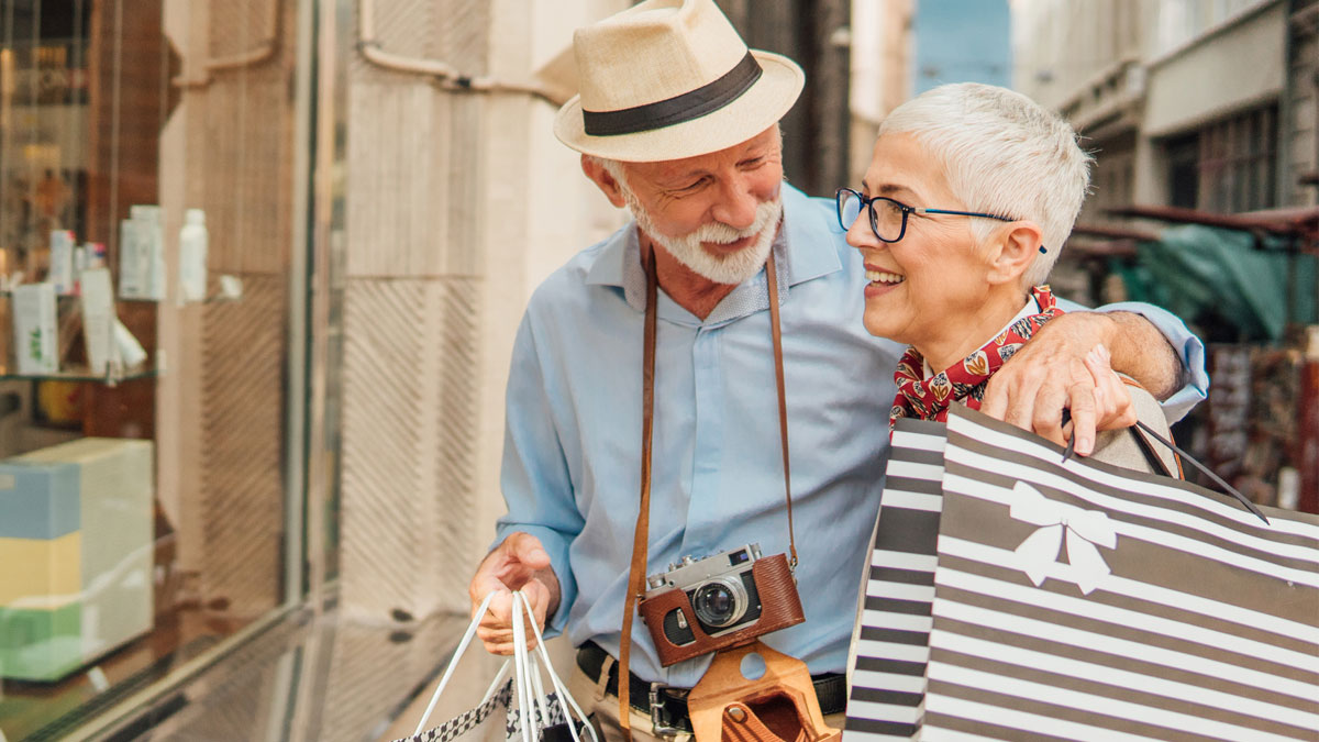 Photo of couple shopping abroad