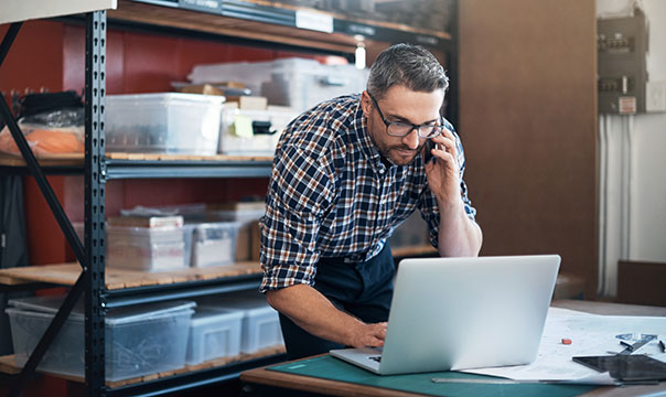 Business owner working on laptop