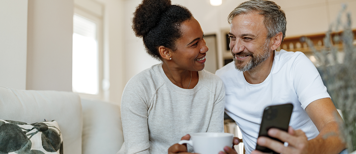 A couple looking at financial paperwork together