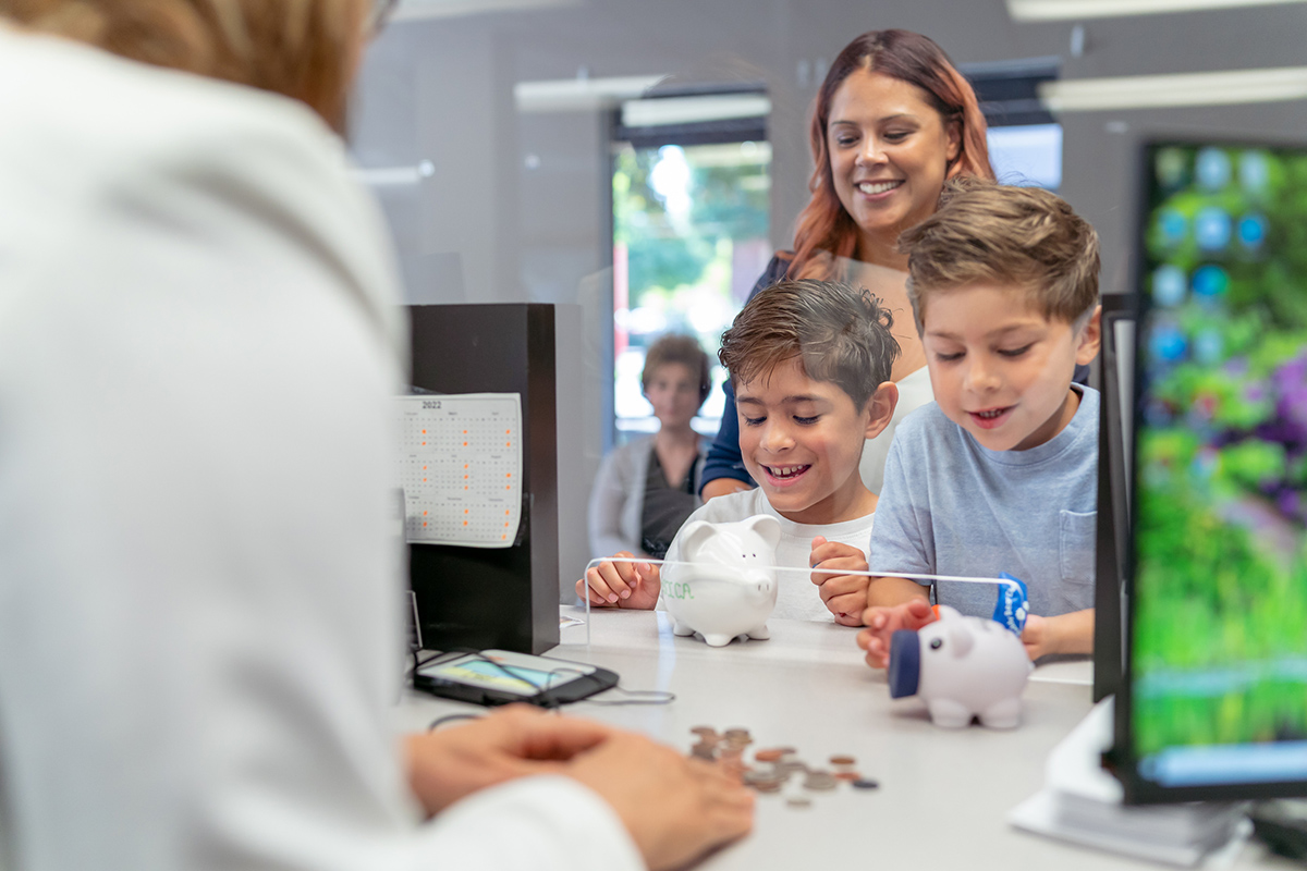 Mom in the bank with kids