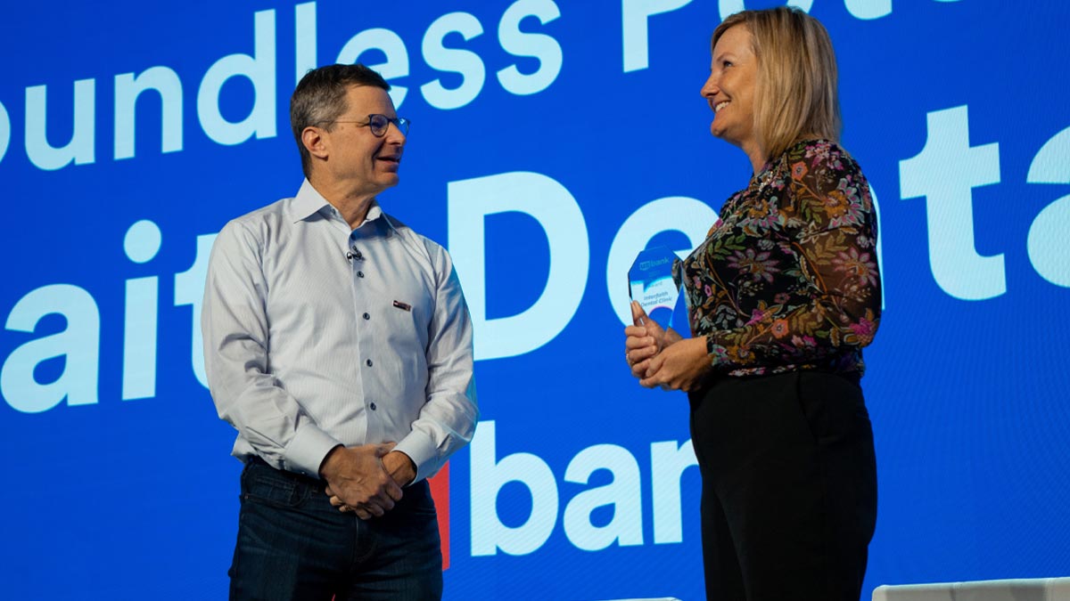 Two people standing on a stage