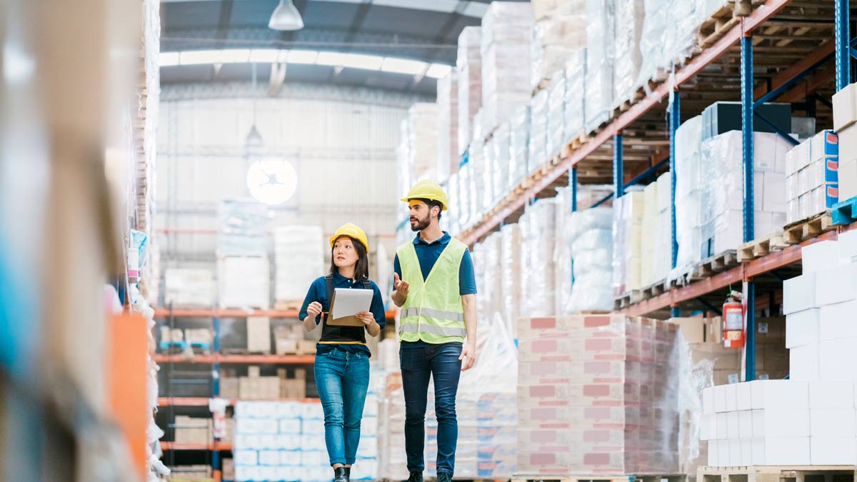 People walking in a warehouse