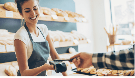 Woman at bakery counter