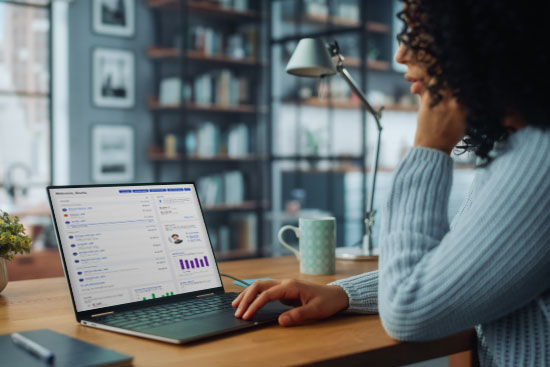 Woman at desk exploring digital banking simulators